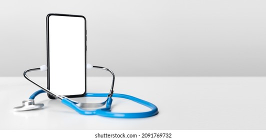 Online Doctor. App Health Phone Mockup. Stethoscope And Cellphone On Grey Background. Online Medical Consultation, Online Medical And Medicine Clinic Connect And Communication With Patient. Copy Space