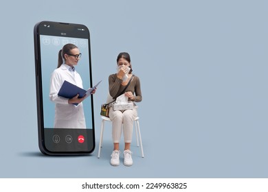 Online doctor taking care of a patient with cold and flu on video call, telemedicine concept - Powered by Shutterstock