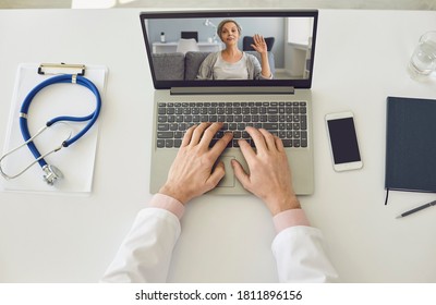 Online Doctor Topview. Senior Woman Waving Hand On Laptop Screen.Mature Woman Using Video Call To Her Doctor. Modern Telemedicine.