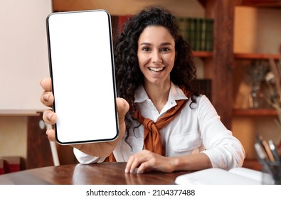 Online Education. Cheerful Young Female Tutor Demonstrating Big Blank Smartphone At Camera, Millennial Teacher Woman Advertising Mobile App For E-Learning And Distance Study, Collage, Mockup