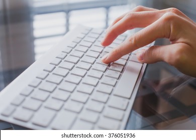 online education concept, using computer, close up of finger pressing key on keyboard