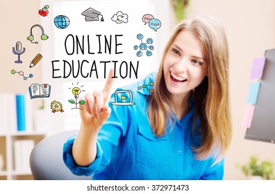 Online Education concept with young woman in her home office - Shutterstock ID 372971473