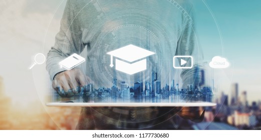 Online education, e-learning and e-book concept. a man using digital tablet for education, with education and online learning media icons