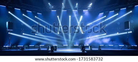 Online event entertainment concept. Background for online concert. Blue stage spotlights. Empty stage with blue spotlights. Blue stage lights. Online COVID-19 concert. Live streaming concert