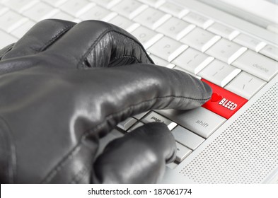Online exploiting heartbleed bug concept with hand wearing black glove 