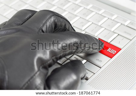 Online exploiting heartbleed bug concept with hand wearing black glove 