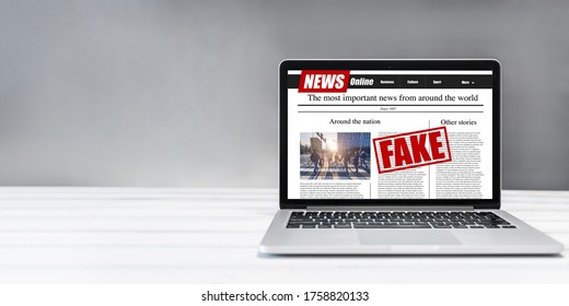 Online Fake News On A Laptop Screen. Mockup Website. Newspaper And Portal On Internet. Copy Space. Concept Of Disinformation And Propaganda