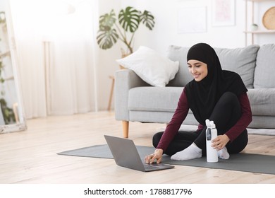 Online Fitness Tutorials Sporty Muslim Woman Stock Photo 1788817796 ...