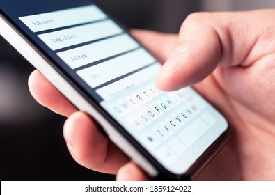 Online form to register personal info and data to web site with mobile phone. Person typing information to internet document, survey or questionnaire with smartphone. Customer registration to website.