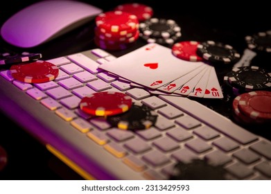 Online Gambling. Online Casino. Poker chips lie on the keyboard. Poker online. Internet.