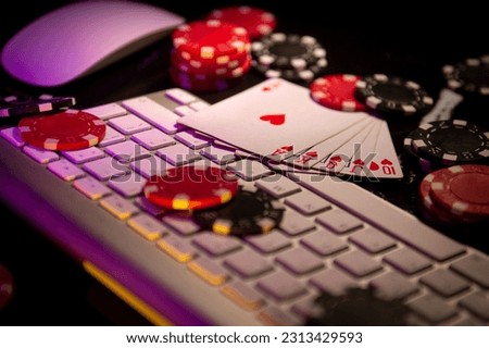 Online Gambling. Online Casino. Poker chips lie on the keyboard. Poker online. Internet.