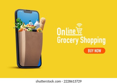 Online grocery shopping and home delivery: bag full of groceries coming out of a smartphone screen - Shutterstock ID 2228613729