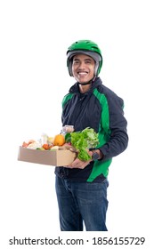 Online Grocery Store. Online Driver Courier Carrying Groceries. Uber Rider Delivery Service Isolated Over White Background