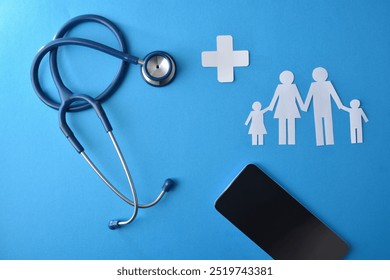 Online healthcare family help and health background with stethoscope and smartphone on blue isolated background with family paper cutouts and medical cross. Top view - Powered by Shutterstock