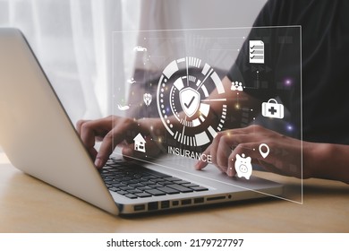 online insurance  Businessmen use computers to make insurance online.  For travel, cars, finance, health, life and family.  insurance concept