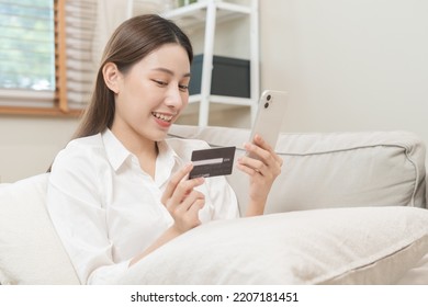 Online Internet Banking, Asian Young Woman Hand In Payment Spending By Scan Qr Code, Use Phone, Mobile To Transfer Money Or Pay Money Of Credit Card Without Cash At Home. Technology Of Financial.