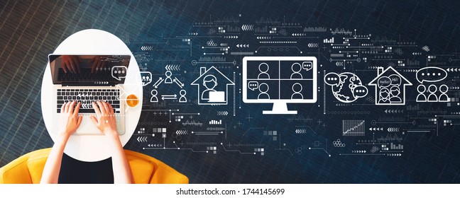 Online meeting theme with person using a laptop on a white table - Shutterstock ID 1744145699