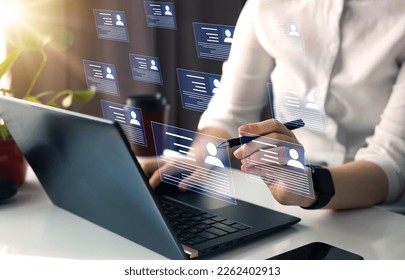 Online and modern technologies for simplifying the human resources system. HR(human resources) technology.Human resource manager checks the CV online to choose the perfect employee for his business. - Shutterstock ID 2262402913