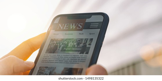 Online News Article On Smartphone Screen. Electronic Newspaper Or Magazine. Latest Daily Press And Media. Mockup Of Digital Portal And Website. Person Using Web Service In The Morning. Reading Text.