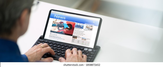 Online Newspaper On Tablet Computer. News Website - Shutterstock ID 1858872652