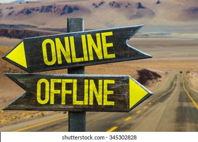 Online - Offline signpost in a desert road background