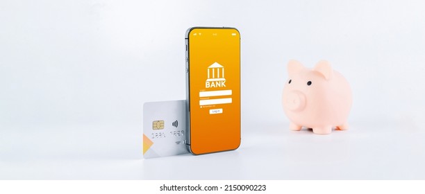 Online Payment. Mobile Phone With Internet Online Bank App. Pig Bank With Credit Card On White Background. Online Wallet Save Money