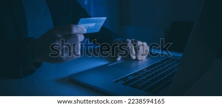Online payment shopping with credit card. Man hand holding creditcard for buy and pay. New banking