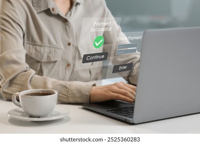 Online payment system interface over computer. Woman working on laptop at table, closeup