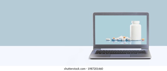 Online Pharmacy. Prescription Drugs And Over The Counter Medication Ready For Delivery To Customers. Pills And White Mockup Jar On Laptop Screen. Drugstore Shopping Banner