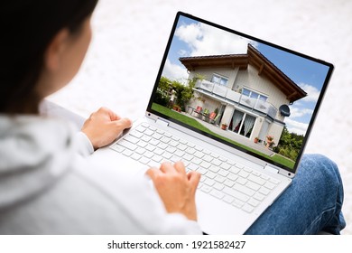 Online Real Estate Home Search On Laptop Computer