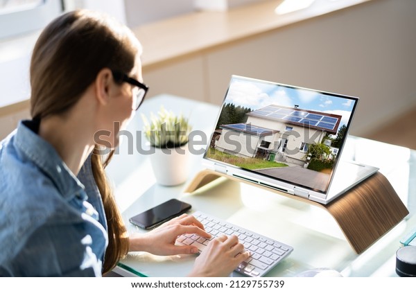 Online Real\
Estate House Property Search On\
Laptop