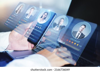 Online recruitment application and one day specialist online search service concept with man smartphone in man hand and virtual digital interface with profile cards contain rating and candidate photo