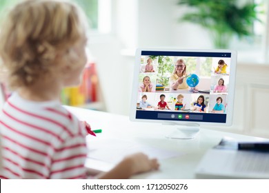 Online Remote Learning. School Kids With Computer Having Video Conference Chat With Teacher And Class Group. Child Studying From Home. Homeschooling During Quarantine And Coronavirus Outbreak.