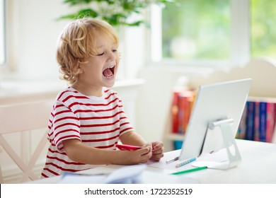 Online Remote Learning. School Kids With Computer Having Video Conference Chat With Teacher And Class Group. Child Studying From Home. Homeschooling During Quarantine And Coronavirus Outbreak.