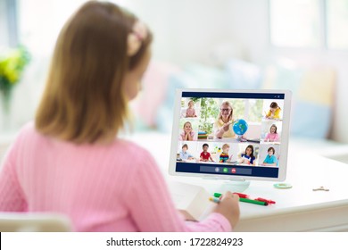 Online Remote Learning. School Kids With Computer Having Video Conference Chat With Teacher And Class Group. Child Studying From Home. Homeschooling During Quarantine And Coronavirus Outbreak.