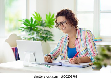 Online remote learning. Teacher with computer having video conference chat with student and class group. Teaching and learning from home. Homeschooling during quarantine and coronavirus outbreak. - Shutterstock ID 1820202989