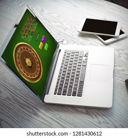 Online Roulette Game  Against Various Technologies With Coffee Cup On Desk In Office