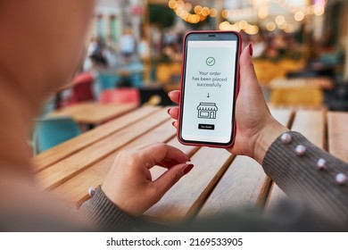 Online shopping. Buying product in online shop. Person paying using mobile payment app. Customer ordering item in e-shop on smartphone. E-commerce over internet. Sending money online - Shutterstock ID 2169533905