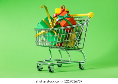 Online Shopping Concept - Trolley Cart Full Of Presents. Black Friday And Ciber Mondey