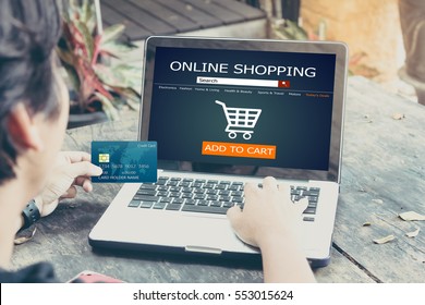 Online Shopping Concept.man Using Laptop And Holding Credit Card,color Filter