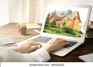 Online Shopping Concept. Woman Looking For House On Real Estate Market Website