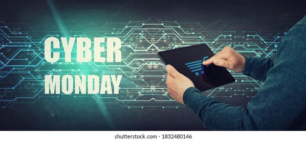 Online shopping, Cyber Monday Sale announcement. Person using tablet computer to browse and order online, buying holiday gifts with promotion discount. E-commerce advertising and marketing concept. - Powered by Shutterstock