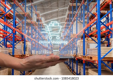 Online Shopping, Ecommerce Over Internet Concept : Shopping Cart Logo On A Smartphone With Warehouse Storage Background, Depicts Modern Lifestyle Consumers Buy Personal Goods From Online Retail Store