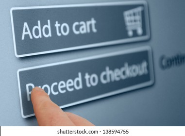 Online Shopping - Finger Pushing Add To Cart Button On Touchscreen