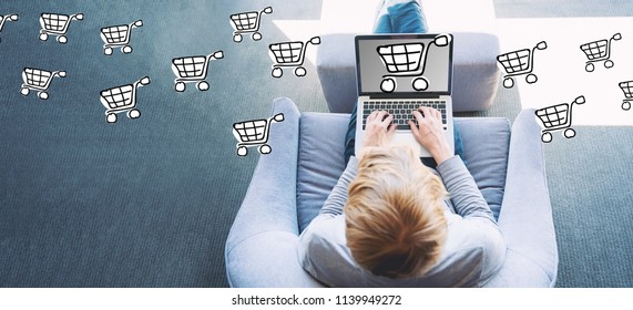 Online Shopping with man using a laptop in a modern gray chair