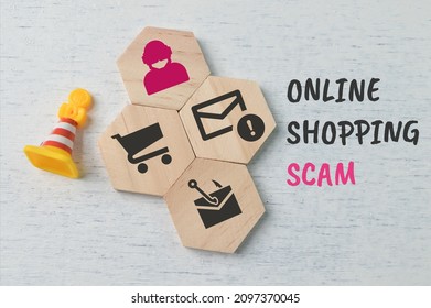 ONLINE SHOPPING SCAM Words And Wooden Hexagon With Cyber Crime Symbols.