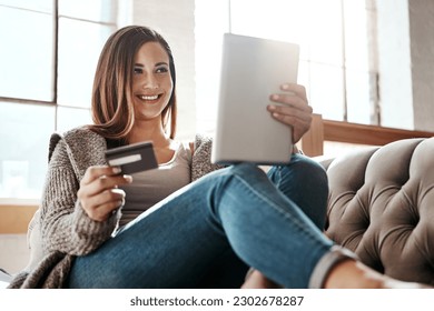 Online shopping, tablet and credit card, happy woman on couch in living room and internet banking app in home. Technology, ecommerce payment and girl on sofa surfing retail website or digital shop. - Shutterstock ID 2302678287