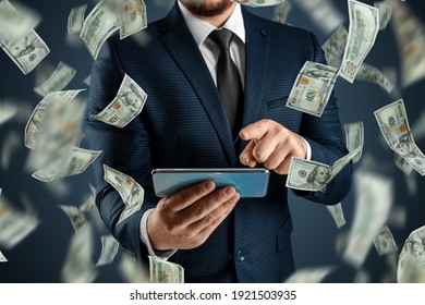 Online sports betting. A man in a suit is holding a smartphone and dollars are falling from the sky. Creative background, gambling
