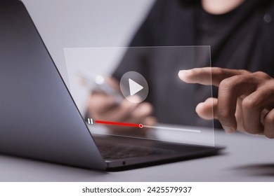 Online streaming concept. Person using laptop watching video on internet, live concert, show or tutorial. multimedia player with play button on virtual screen.