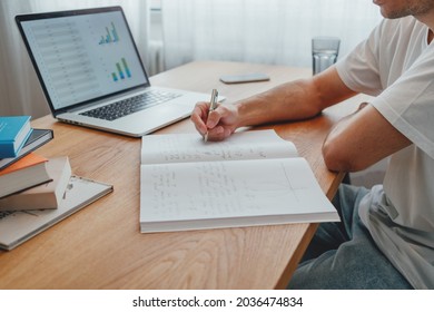 Online Student Prepare For Pass Exam To University Using Laptop. Adult Man At College Making Universitet Subjects